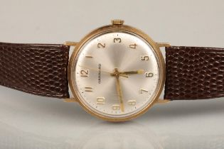 Garrard & Co. 9ct gold gentleman's presentation wristwatch, the gold cased silvered dial with