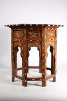 Anglo Indian teak occasional table in the manner of Liberty & Co, late 19th century, the octagonal