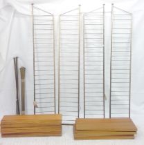 Set of 1970s Ladderax shelving including four upright frames and twenty-two teak shelves of two