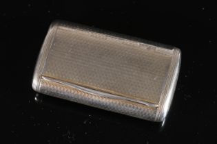 Georgian antique parcel gilt silver snuff box of oval cushion form with all over engine turned