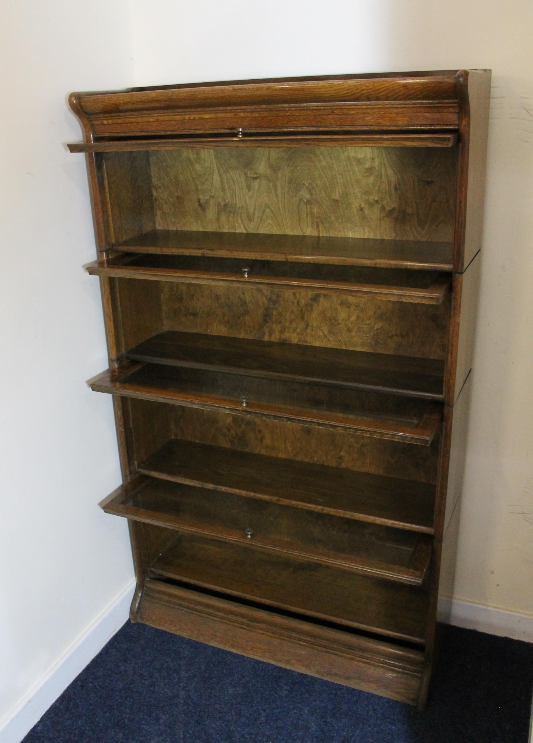 20th century oak Globe Wernicke style four tier bookcase, with up and over glazed doors on plinth - Image 3 of 4