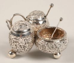 Chinese silver condiment set, with embossed prunus decoration, maker Wan Hin, 134 grams.