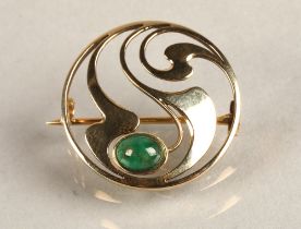 Murrle Bennett Ladies yellow metal circular brooch set with a cabochon stone, 4 grams.
