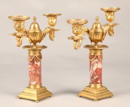 Pair of gilt and marble garnitures, 25 cm high.