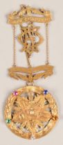 9ct gold gem set masonic medal, presented to bro David Carnegie past patron from the members of
