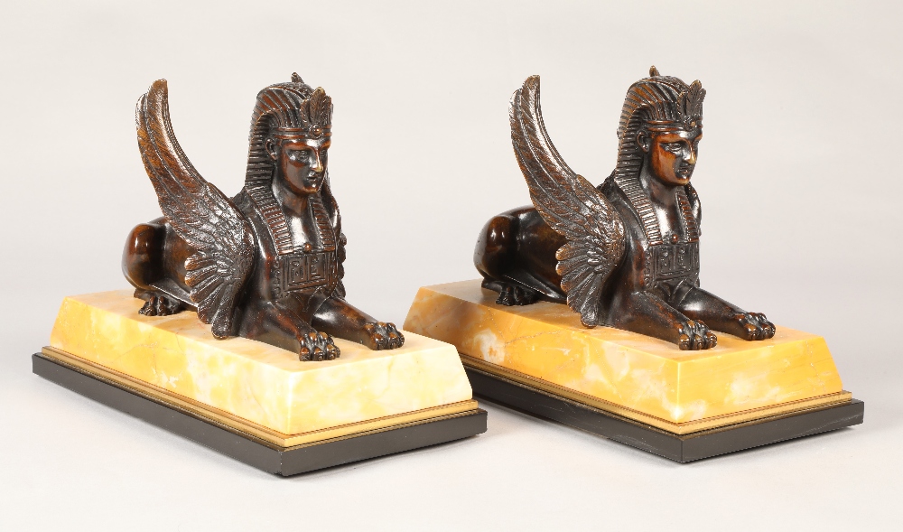 Pair of bronze Egyptian revival winged Sphinx on marble base, overall length 28 cm  (2)