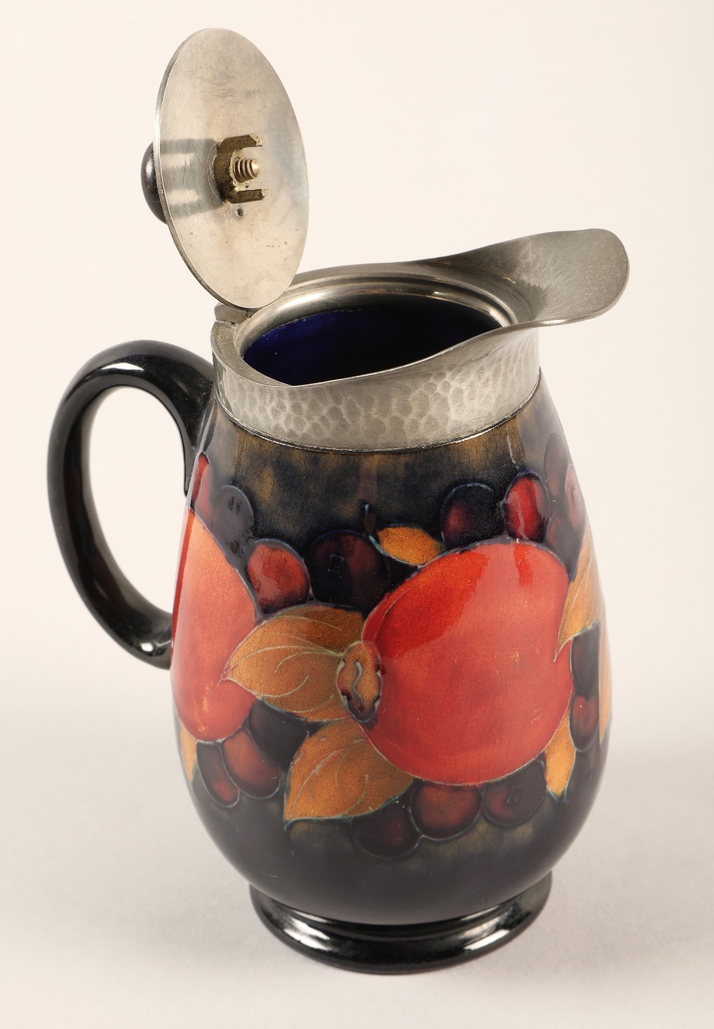 Moorcroft pottery Tudric pewter three piece tea service, pomegranate pattern designed by William - Image 7 of 22