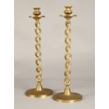 Pair of Barley twist brass candlesticks, 47.5cm high.