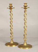 Pair of Barley twist brass candlesticks, 47.5cm high.