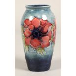 Moorcroft pottery vase of baluster form, pale blue ground in the anemone pattern, impressed marks