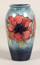 Moorcroft pottery vase of baluster form, pale blue ground in the anemone pattern, impressed marks