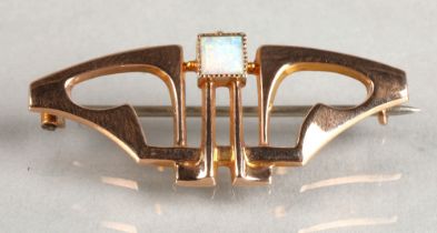 Murrle Bennett 9ct gold bar brooch set with an opal, 2.2 grams.