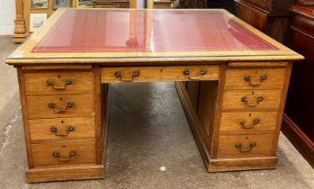 Edwardian oak leather topped partners desk