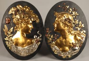 Pair of oval Art Nouveau gilt metal figure bust wall plaques, (possibly Glasgow School)60 cm