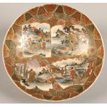 Japanese satsuma bowl of shallow circular form, decorated with enamels and gilt figures within