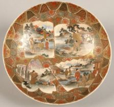 Japanese satsuma bowl of shallow circular form, decorated with enamels and gilt figures within