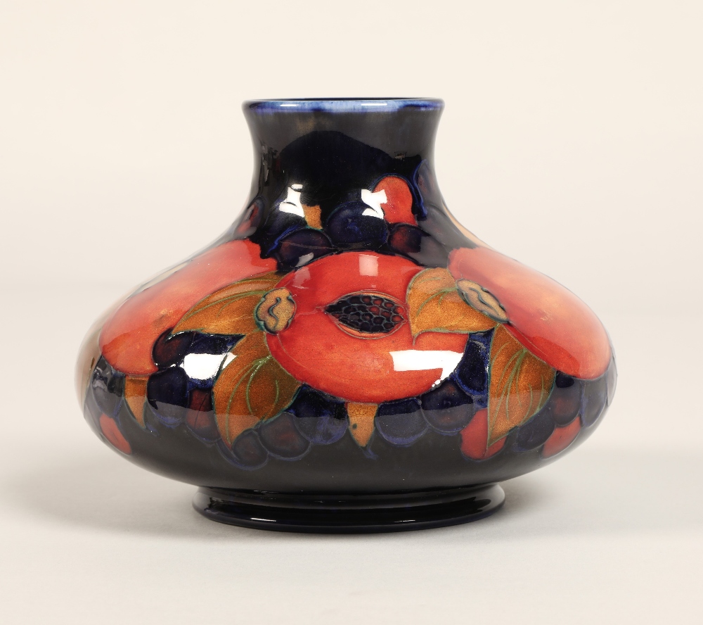 Moorcroft pottery vase, of squat form, blue ground in the pomegranate pattern, impressed mark with - Image 5 of 12