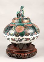 Japanese pottery censer with cover, finial with two dragons, marks to base,  on hardwood stand, 33cm