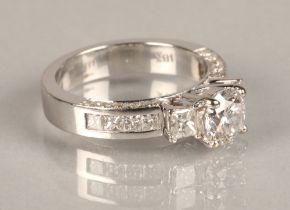 Ladies 18ct white gold three stone diamond ring, central stone round brilliant cut diamond 1.2