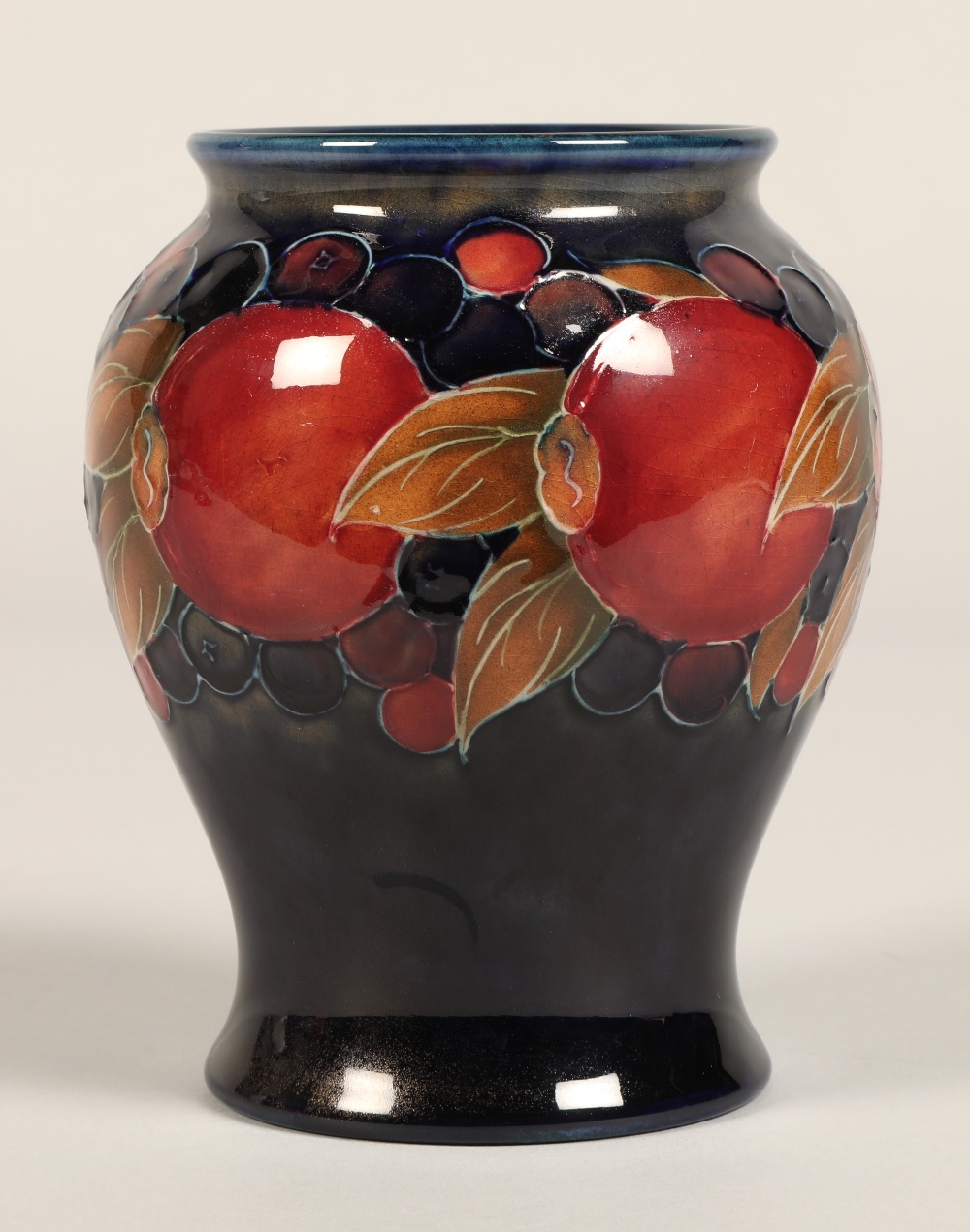Moorcroft pottery vase of baluster form, pomegranate pattern, blue signature to base, 15cm high. - Image 8 of 9