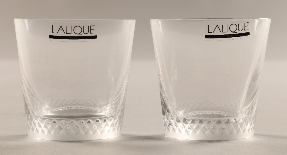 Pair of small Lalique whisky tumblers, etched Lalique France to the base, 6.5 cm high in Lalique box