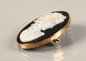 Ladies 9ct yellow gold mounted opal cameo brooch.