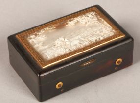 A 19th century two air tortoise-shell musical box, the lid inset with a mountain landscape made from