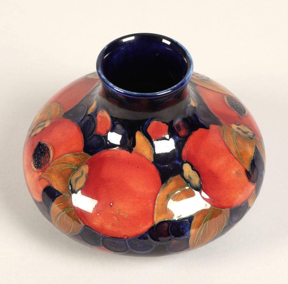Moorcroft pottery vase, of squat form, blue ground in the pomegranate pattern, impressed mark with - Image 8 of 12