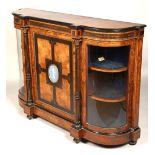 Victorian walnut credenza, central solid door mounted with oval wedgwood panel of classical