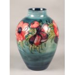 Moorcroft pottery vase in the anemone pattern, 28cm high.