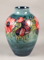 Moorcroft pottery vase in the anemone pattern, 28cm high.