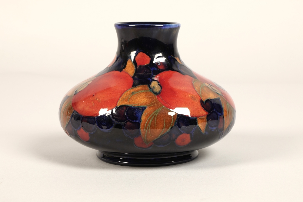Moorcroft pottery vase, of squat form, blue ground in the pomegranate pattern, impressed mark with - Image 3 of 12