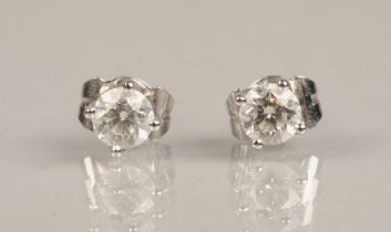 Pair of ladies 18ct white gold diamond stud earrings, each stone 0.33 carat.