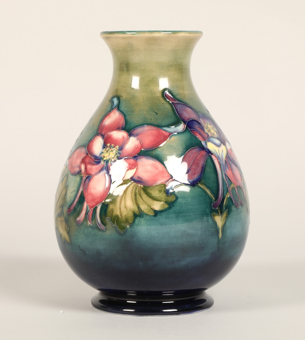 Moorcroft pottery vase of baluster form, green/blue ground in the clematis pattern, signed in blue - Image 13 of 13