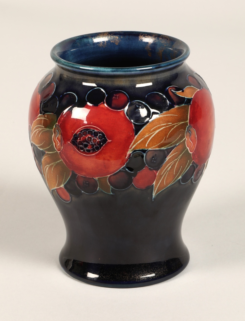 Moorcroft pottery vase of baluster form, pomegranate pattern, blue signature to base, 15cm high. - Image 3 of 9