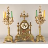 Three piece garniture clock set, by Brysons, Paris, 50cm high.