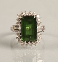 Ladies 18ct white gold emerald and diamond ring, central emerald surrounded by twenty small