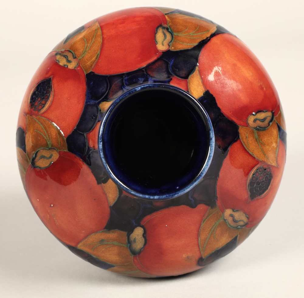 Moorcroft pottery vase, of squat form, blue ground in the pomegranate pattern, impressed mark with - Image 9 of 12