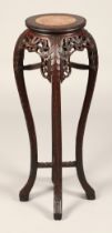 Chinese carved hardwood jardiniere stand, with rouge marble insert, with carved apron and under
