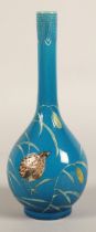 Chinese bottle shaped vase, blue ground with two quail  amongst vines, 25cm high.