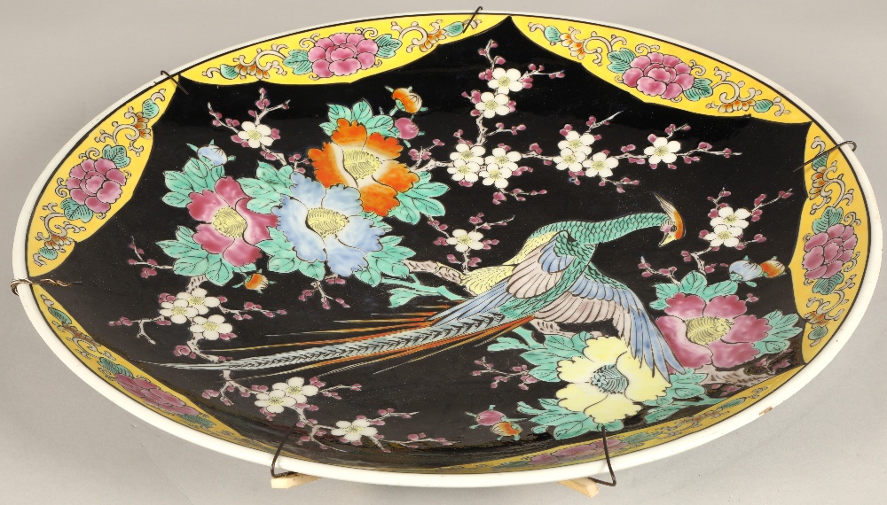 Japanese porcelain charger, black ground with bird and foliate decoration, 46cm diameter. - Image 4 of 6