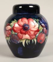 Moorcroft pottery ginger jar with cover, blue ground with tube-lines stylised flowers, impressed