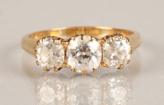 Ladies three stone graduated diamond ring, mounted on yellow metal, central stone approximately 0.