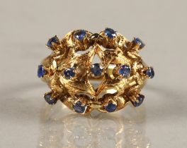 Ladies 18ct yellow gold sapphire ring, mounted with thirteen small sapphires, ring size N.