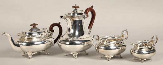 Three piece silver tea service with silver plated coffee pot, assay marked Sheffield 1930, maker