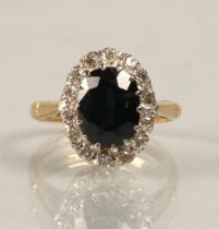 Ladies 18ct yellow gold sapphire and diamond ring, ring size I/J.