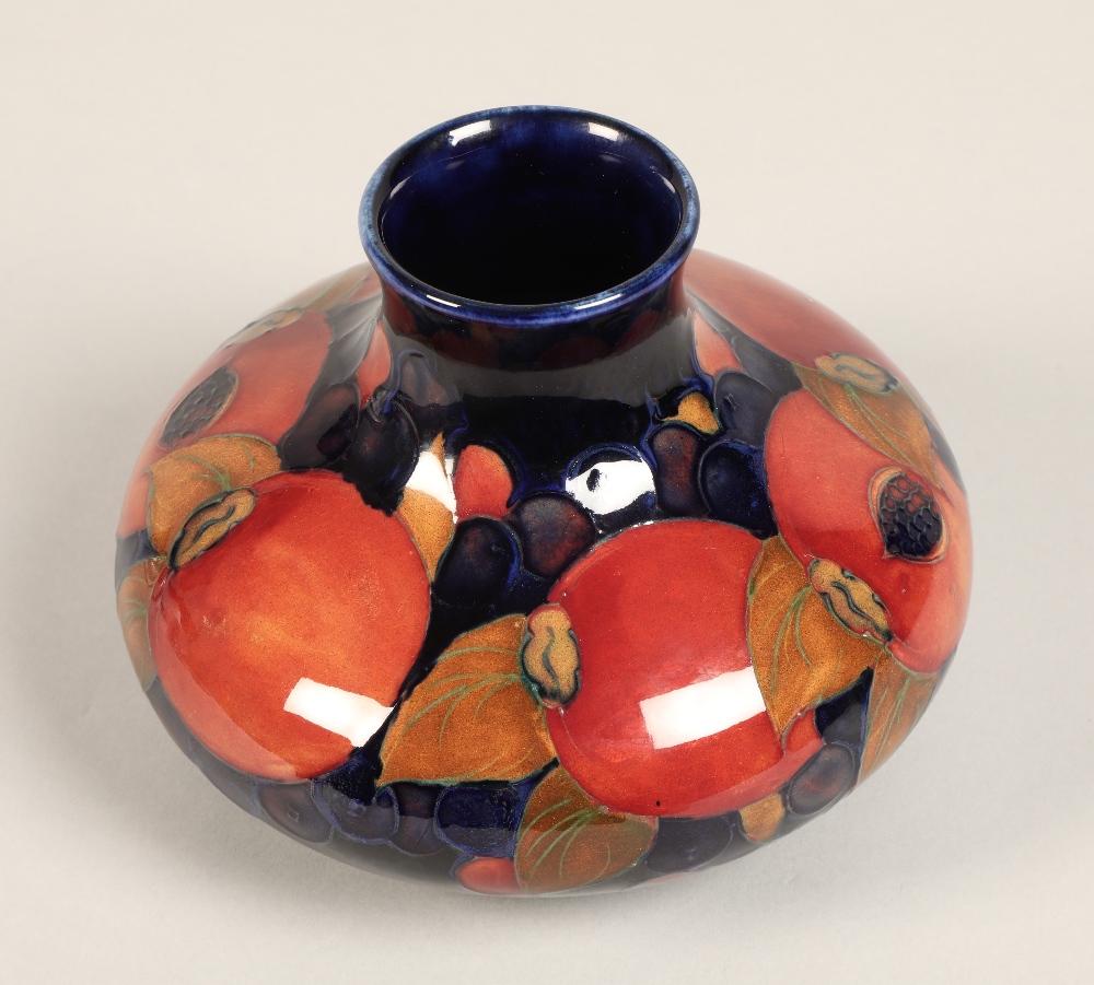 Moorcroft pottery vase, of squat form, blue ground in the pomegranate pattern, impressed mark with - Image 7 of 12