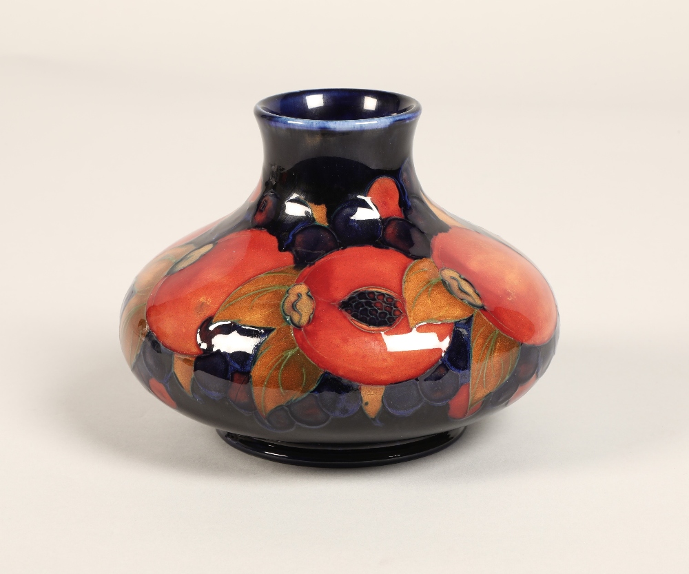Moorcroft pottery vase, of squat form, blue ground in the pomegranate pattern, impressed mark with - Image 4 of 12