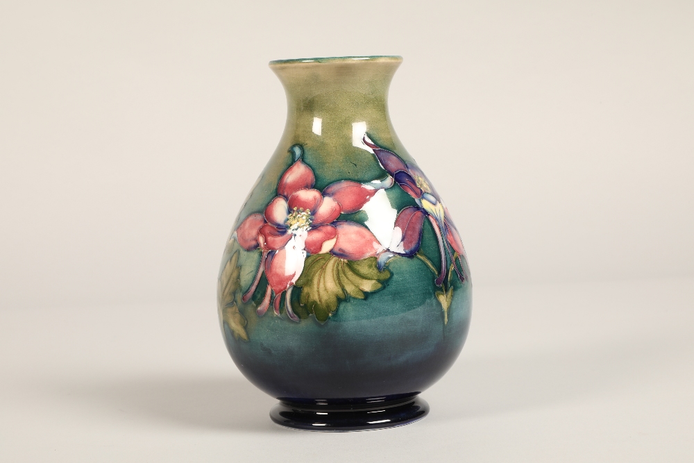 Moorcroft pottery vase of baluster form, green/blue ground in the clematis pattern, signed in blue - Image 11 of 13