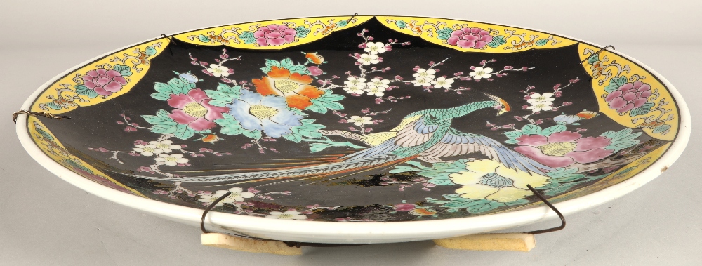 Japanese porcelain charger, black ground with bird and foliate decoration, 46cm diameter. - Image 5 of 6